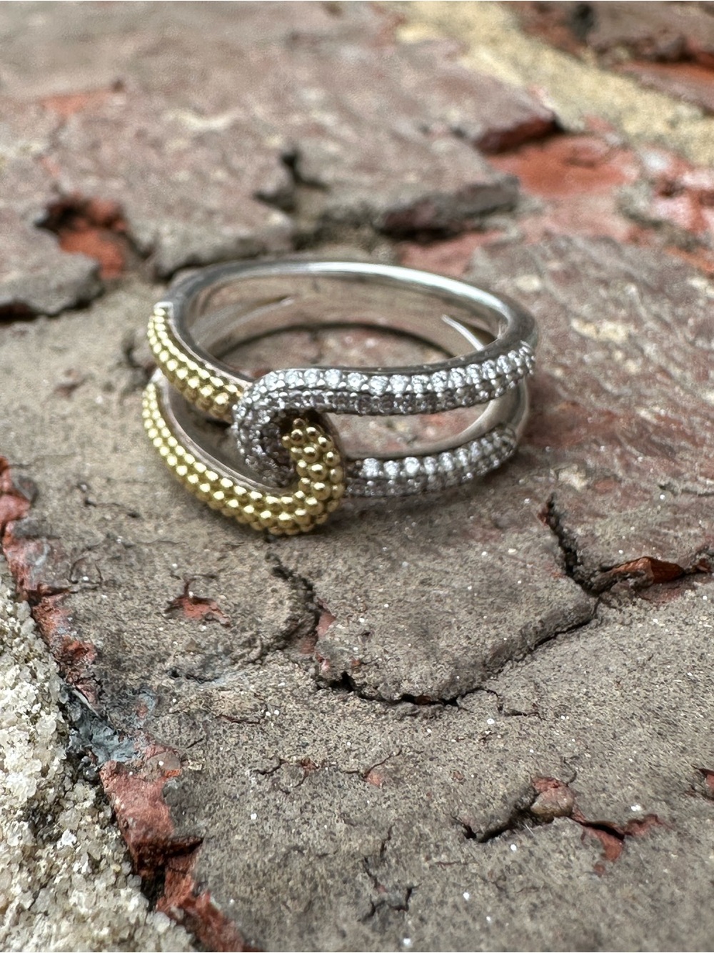 LAGOS Two-Tone 18k Gold Caviar and Sterling Silver Knot Ring with diamonds.